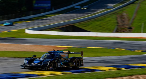 #10 Konica Minolta Cadillac DPi-V.R. Cadillac DPi, DPi: Renger Van Der Zande, Ryan Briscoe