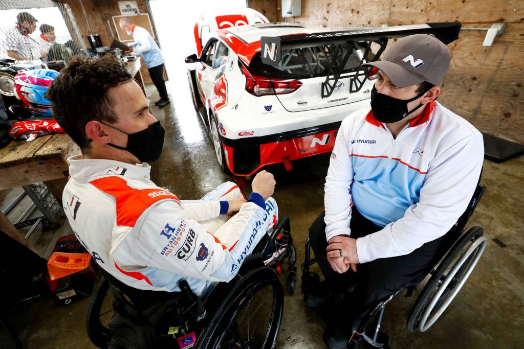 #54: Robert Wickens, Bryan Herta Autosport, Universal Coating, Hyundai Veloster N TCR, Michael Johnson