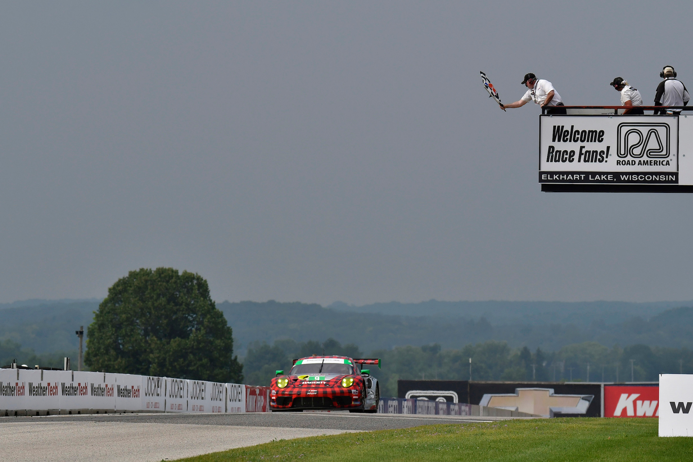 #9: Pfaff Motorsports Porsche 911 GT3R, GTD: Zacharie Robichon, Laurens Vanthoor, checkered flag, checkered, winner
