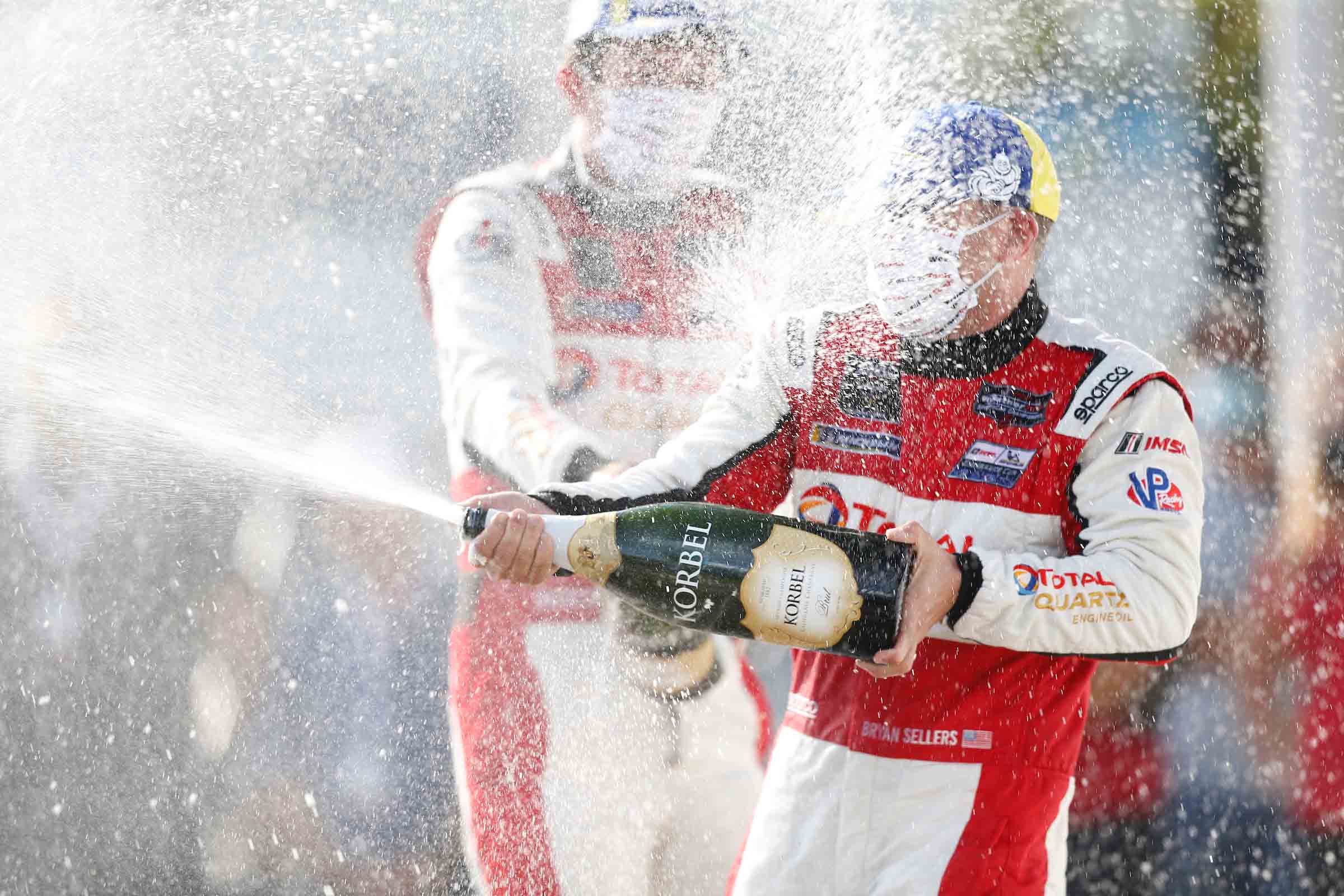 #1: Paul Miller Racing Lamborghini Huracan GT3, GTD: Madison Snow, Bryan Sellers, winner, podium, champagne, #16: Wright Motorsports Porsche 911 GT3R, GTD: Patrick Long, Trent Hindman