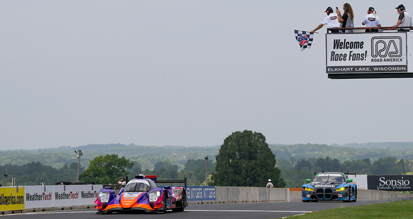 #52: PR1 Mathiasen Motorsports, ORECA LMP2 07, LMP2: Ben Keating, Paul-Loup Chatin winner checkered flag