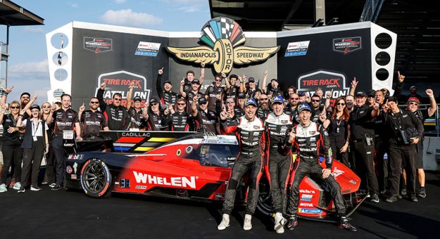 Winners #31: Cadillac Whelen, Cadillac V-Series.R, GTP: Jack Aitken, Earl Bamber, Frederik Vesti and team on the podium