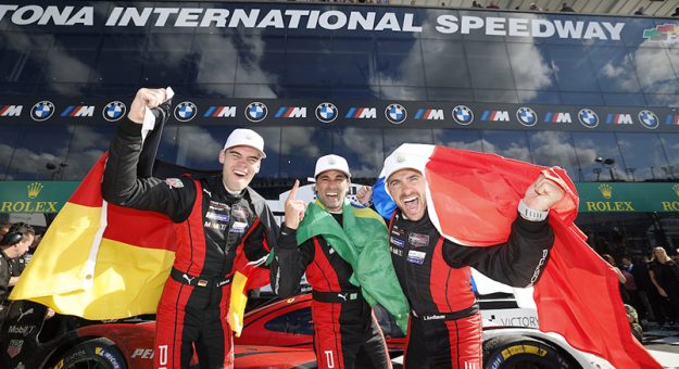 #7: Porsche Penske Motorsport, Porsche 963, GTP: Felipe Nasr, Julien Andlauer, Laurin Heinrich celebrate in victory lane