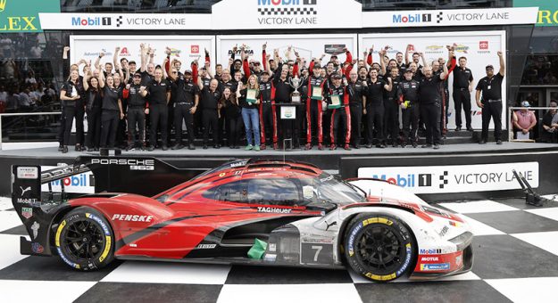 #7: Porsche Penske Motorsport, Porsche 963, GTP: Felipe Nasr, Julien Andlauer, Laurin Heinrich celebrate on the podium with team