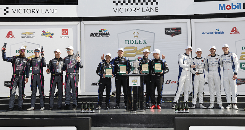 #57: WINWARD RACING, Mercedes-AMG GT3, GTD: Russell Ward, Philip Ellis, Indy Dontje, Lucas Auer, #44: Magnus Racing, Aston Martin Vantage GT3 Evo, GTD: John Potter, Spencer Pumpelly, Nicki Thiim, Madison Snow, #27: Heart of Racing Team, Aston Martin Vantage GT3 Evo, GTD: Tom Gamble, Dudu Barrichello, Zacharie Robichon, Mattia Drudi celebrate in victory lane