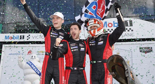 #7: Porsche Penske Motorsport, Porsche 963, GTP: Felipe Nasr, Julien Andlauer, Laurin Heinrich celebrate in victory lane