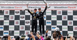 Winners #5: JDC-Miller MotorSports, Porsche 963, GTP: Tijmen van der Helm, Laurin Heinrich on the podium