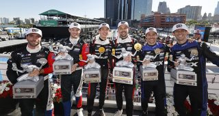 #31: Cadillac Whelen, Cadillac V-Series.R, GTP: Jack Aitken, Earl Bamber, #25: BMW M Team WRT, BMW M Hybrid V8, GTP: Philipp Eng, Marco Wittmann, #10: Cadillac Wayne Taylor Racing, Cadillac V-Series.R, GTP: Ricky Taylor, Filipe Albuquerque celebrate on the podium