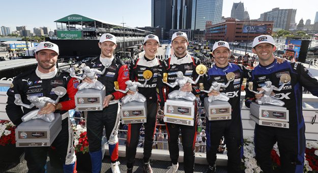 #31: Cadillac Whelen, Cadillac V-Series.R, GTP: Jack Aitken, Earl Bamber, #25: BMW M Team WRT, BMW M Hybrid V8, GTP: Philipp Eng, Marco Wittmann, #10: Cadillac Wayne Taylor Racing, Cadillac V-Series.R, GTP: Ricky Taylor, Filipe Albuquerque celebrate on the podium