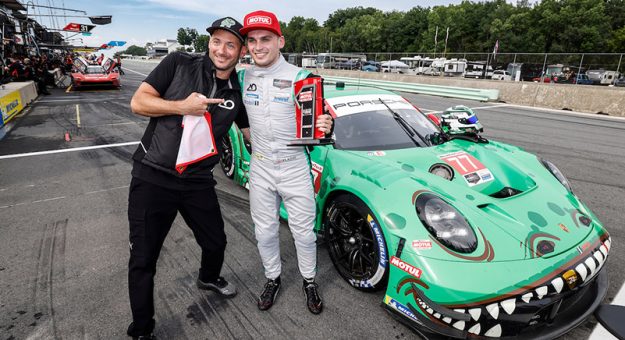 Motul Pole Award winner #77: AO Racing, Porsche 911 GT3 R (992), GTD Pro:  Harry King with teammate Nick Tandy