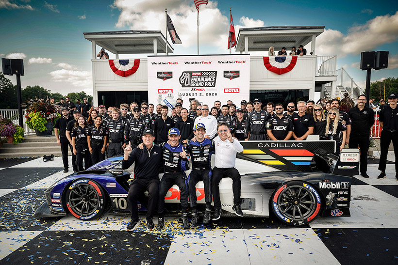Winners #10: Cadillac Wayne Taylor Racing, Cadillac V-Series.R, GTP: Ricky Taylor, Filipe Albuquerque and team celebrate in Victory Lane with Dr. Eric Warren of GM/Cadillac