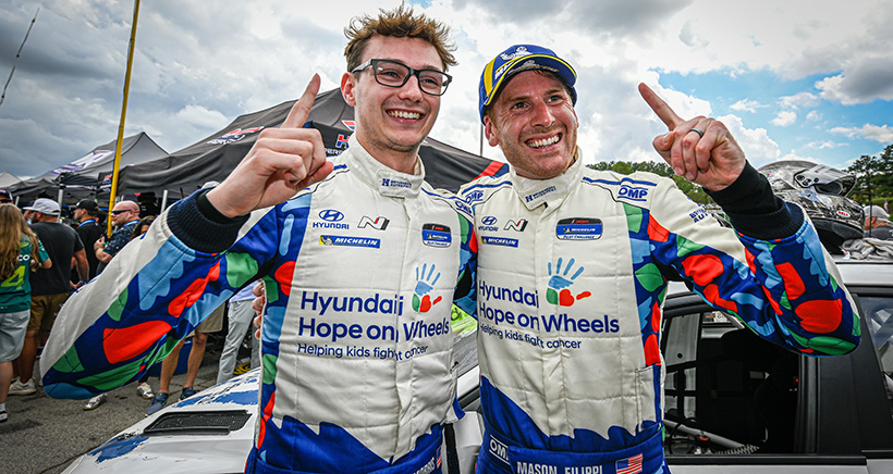 #33: Bryan Herta Autosport with Curb Agajanian, Hyundai Elantra N TCR, TCR: Bryson Morris, Mason Filippi, Podium, Celebration, Championship Winner