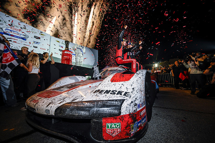 #6: Porsche Penske Motorsport, Porsche 963, GTP: Laurens Vanthoor, Kevin Estre, Matt Campbell celebrate in victory lane