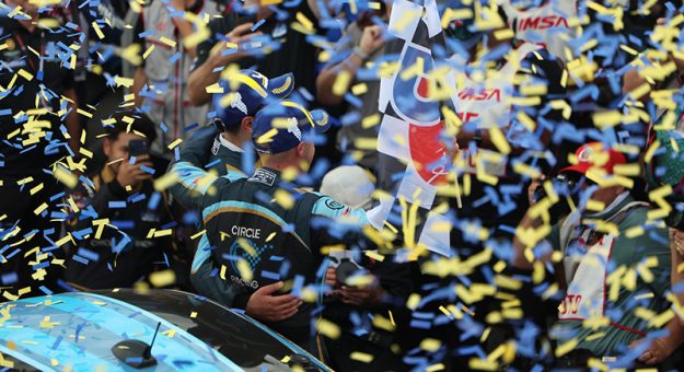 #14: Circle H Racing, Aston Martin Vantage AMR GT4 Evo, GS: Thomas Merrill, Martin Sarukhanyan, podium, celebration