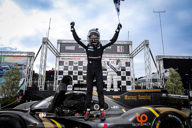 Winner #5: JDC-Miller MotorSports, Porsche 963, GTP: Laurin Heinrich, on the podium