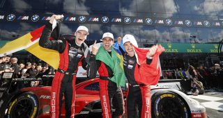 #7: Porsche Penske Motorsport, Porsche 963, GTP: Felipe Nasr, Julien Andlauer, Laurin Heinrich celebrate in victory lane