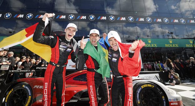 #7: Porsche Penske Motorsport, Porsche 963, GTP: Felipe Nasr, Julien Andlauer, Laurin Heinrich celebrate in victory lane